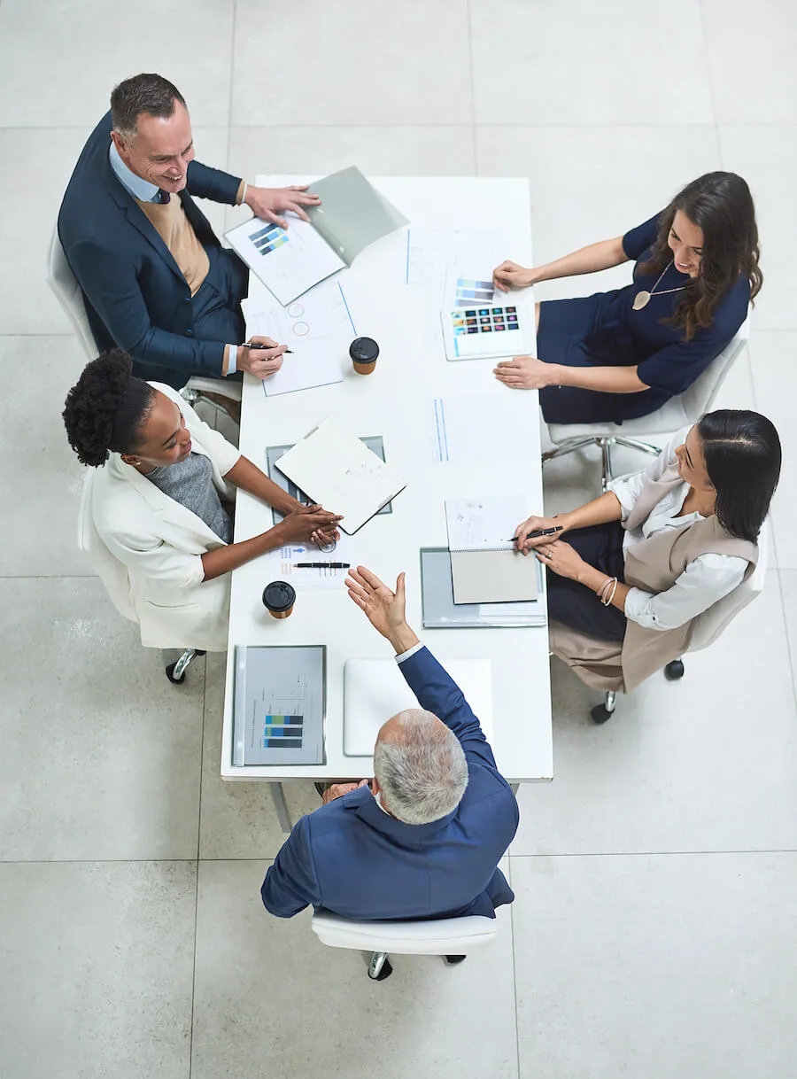 business team sitting around a table